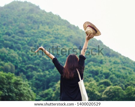Happy young woman travel relax in the holiday. Travel hiking. Travel and wanderlust concept. 