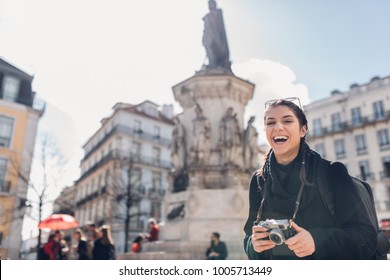 Happy Young Woman Travelling And Visiting Europe.Backpacker Touring Europe And Mediterranean Culture.