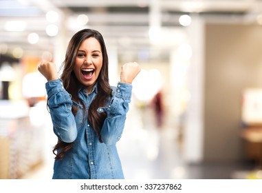 happy young woman victory sign - Shutterstock ID 337237862