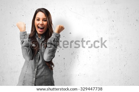 happy young woman victory sign