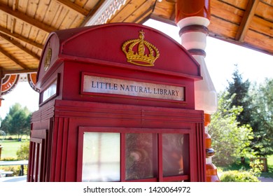 HARBIN, CHINA, OCTOBER 2, 2018: British Style Red Telephone Booth Library At Volga Manor Theme Park