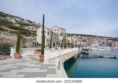 Harbor with Luxury Yachts under blue sky moored in the protected bay of the Adriatics. - Shutterstock ID 2251141835