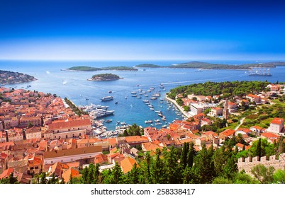 Harbor of old Adriatic island town Hvar. High angle panoramic view. Popular touristic destination of Croatia.