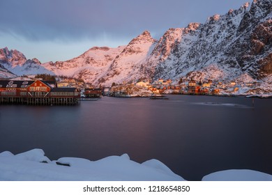 Harbor, Rorbuer And Snowy Mountains At Sunrise In Å, Moskenesøya, Lofoten, Norway