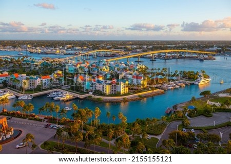 Harborside Villas aerial view at Nassau Harbour with Nassau downtown at the background at sunset, from Paradise Island, Bahamas.