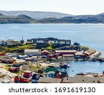 Harbour and homes in Qaqortoq, located in the Kujalleq municipality in Southern Greenland, located near Cape Thorvaldsen.