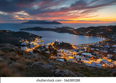 Harbour of Ios island and Sikinos island in the distance. - Shutterstock ID 566389288
