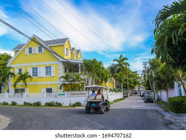 HARBOUR ISLAND, BAHAMAS  - JUNE 11, 2019:  Golf cart in the street of Dunmore Town at Harbour Island, the Bahamas
