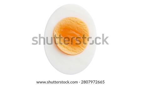 Hard boiled egg sliced in half showing yellow yolk and white albumen