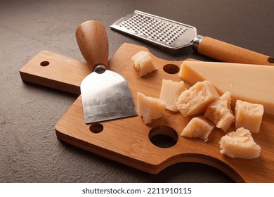 Hard Cheese, Parmesan, On A Cutting Board, Cheese Knife, Grater, Top View, No People,