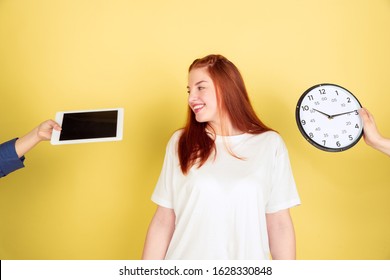 Hard Choice. Caucasian Young Woman's Portrait On Yellow Studio Background, Too Much Tasks. How To Manage Time Right. Concept Of Office Working, Business, Finance, Freelance, Self Management, Planning.