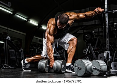 Hard Core Bodybuilding. Bodybuilder Ready To Lift Heavy Dumbbell