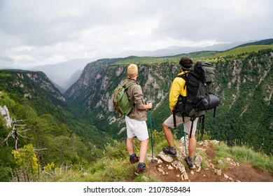 Hard, difficult, tiring and exhausting expedition of friends. Trekking, outdoor, activity concept. - Shutterstock ID 2107858484