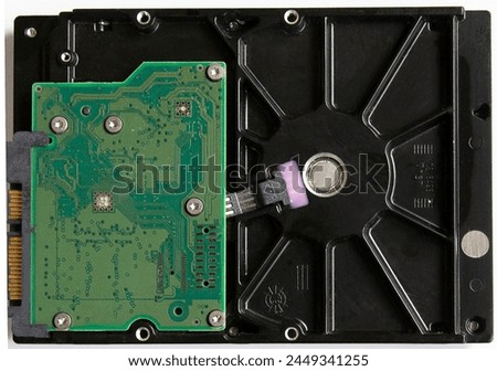 Hard disk drive (HDD). Hard drive or fixed disk. Electro-mechanical data storage device. Closeup