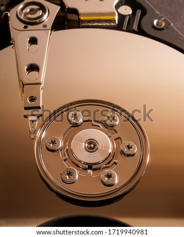 Hard drive computer storage internal design. After being dismantled. four terabyte hard drive interior.