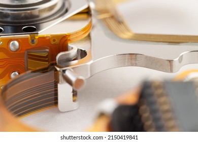 Hard Drive Detail With Shiny Metal Parts And Light Background Macro