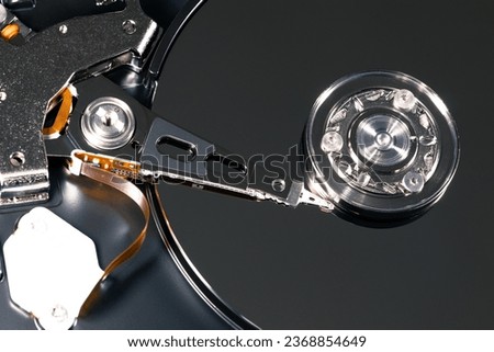 Hard drive from the inside. Surface with hard drive data. HDD inside