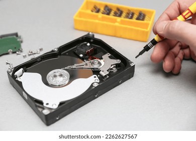 hard drive repair in workshop. concept of hdd repairing. data recovery from hard drive