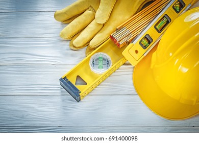 Hard Hat Protective Gloves Construction Level On White Board