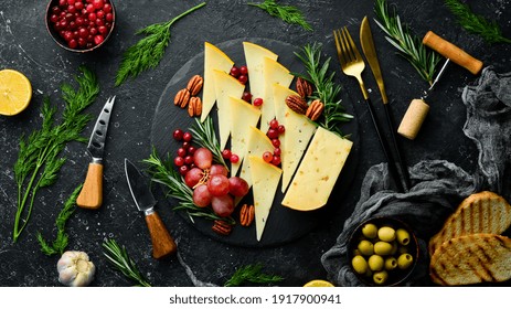 Hard Nut Cheese With Nuts On A Plate With Snacks. Rustic Style. Free Copy Space.