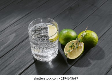 Hard Seltzer With Lime On A Dark Wooden Background