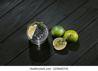 Hard Seltzer With Lime On A Dark Wooden Background. Top View.