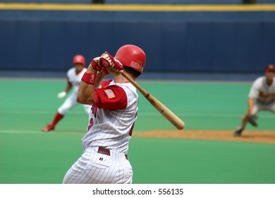 Hard Swing, Baseball Batter Swinging And Missing