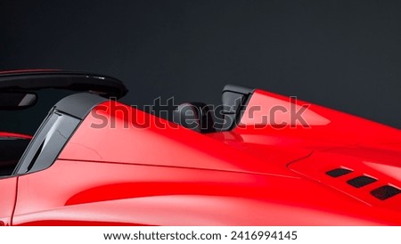 Hard top off of a red car