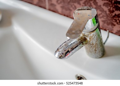 Hard Water Deposit On A Tap