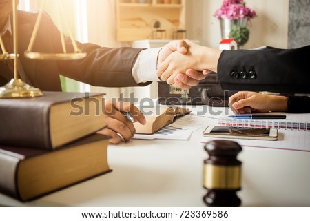 The hard work of an asian lawyer in a lawyer's office. Counseling and giving advice and prosecutions about the invasion of space between private and government officials to find a fair settlement. Stock foto © 
