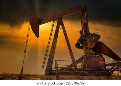 Hard Working Pump Jack Sunset In Midland Texas Permian Oil Fields