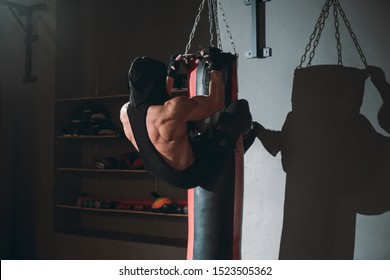 Hard Workout Exercises Guy Doing Abs While Holding With Legs The Boxing Punching Bag He All Sweating Have A Intense Workout