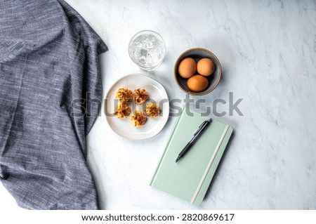 Hardboiled Edds and Macaroons on table top
