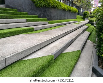 Hardscape of modern building stairway decoration with artificial grass / park and outdoor design conceptual