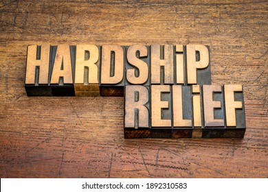 Hardship Relief Word Abstract In Vintage Letterpress Wood Type Against Rustic Wooden Background, Help, Support And Assistance