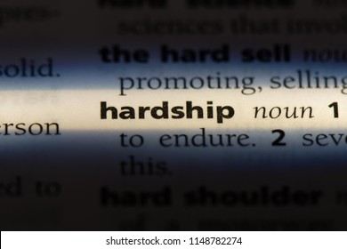 Hardship Word In A Dictionary. Hardship Concept.