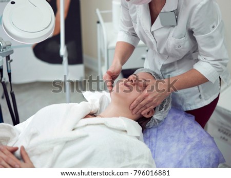 Similar – Female doctor giving medication to elderly patient