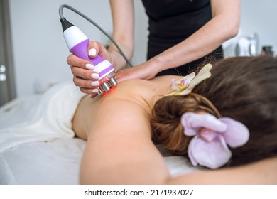 Hardware figure correction with vacuum her back massage. Overweight treatment, body sculpting. - Shutterstock ID 2171937027