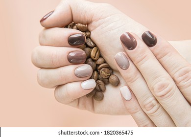 hardware manicure done in beauty salon  brown color gradient nails  autumn shades chocolate   coffee