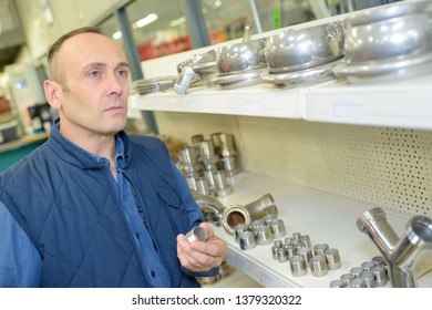 hardware salesman in plumber section