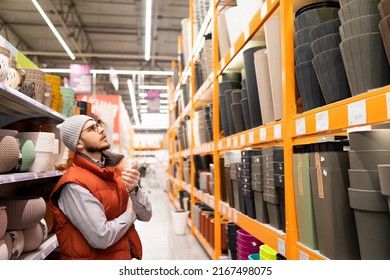 Hardware Store Customer Chooses Plant Pot