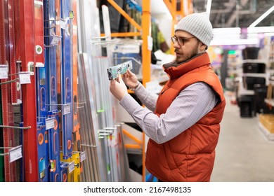 Hardware Store Customer Chooses Plant Pot