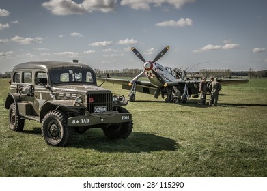 HARDWICK AIRFIELD, NORFOLK, UK - APRIL 18 - The airfield hosts a unique photographic event with restored militaryaircraft and volunteers reenacting scenes from WW2. 18 April 2015 in Norfolk.