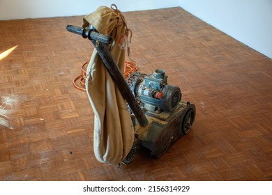 A Hardwood Floor Grinder Or A Sanding Machine In A Room