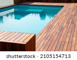Hardwood ipe pool deck on direct sun heat, summer swimming pool decking design idea