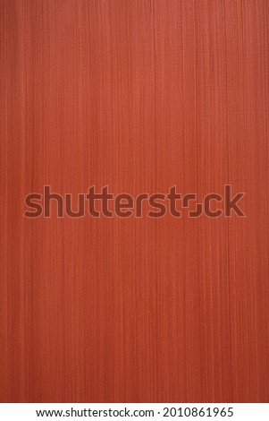 hardwood plywood surface background, smooth and sanded building board with reddish tone texture for designing