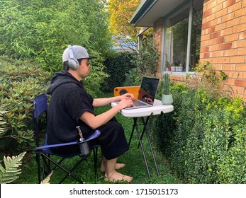 Hardworking Man Quarantined At Home, Relaxing Outside Of The House