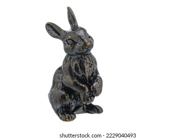 Hare Rabbit Vintage Antique grunge bronze brass figurine statue of beautiful animal, isolated on white background. Decoration Sculpture for interior. Copy Space for Text. Selective soft focus - Shutterstock ID 2229040493