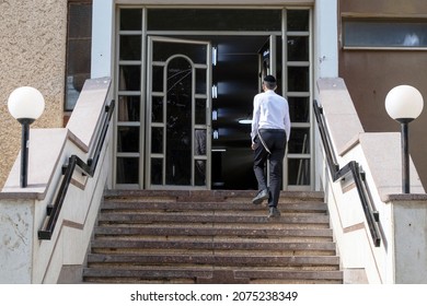 Haredi (Charedi) Orthodox Jewish Religious Man Entering Yeshiva.