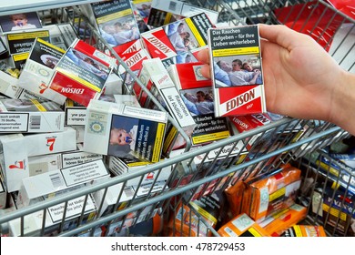 HAREN, GERMANY - AUGUST 23, 2016: Edison Cigarettes A Private Label Brand Of Aldi Supermarkets. Pictures On Cigarette Packs, Warning Of Smoking Dangers, Increased Quit Attempts Among Smokers.